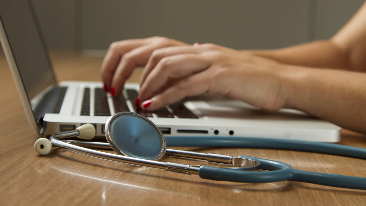 A patient meeting with a physician by laptop