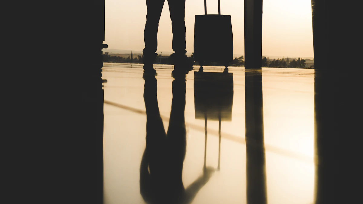 Travelers and luggage inside an airport terminal