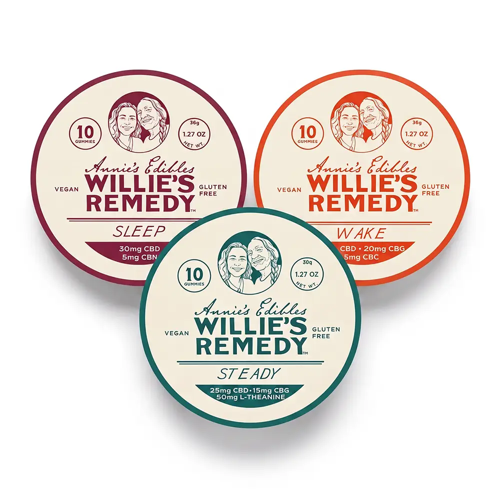 Three round Willie's Remedy gummy tins labeled Sleep, Wake and Steady